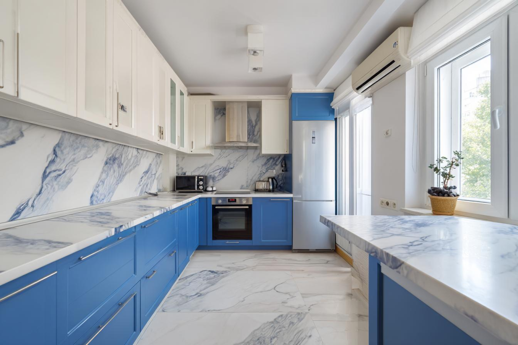 Bright blue and white modern kitchen interior