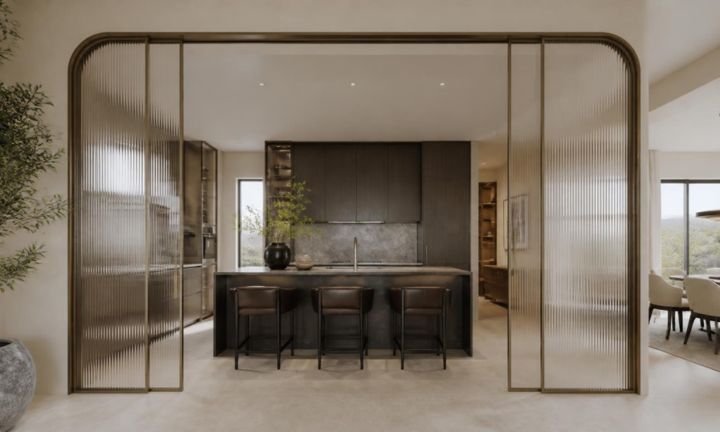Fluted bronze arch with glass pocket sliders