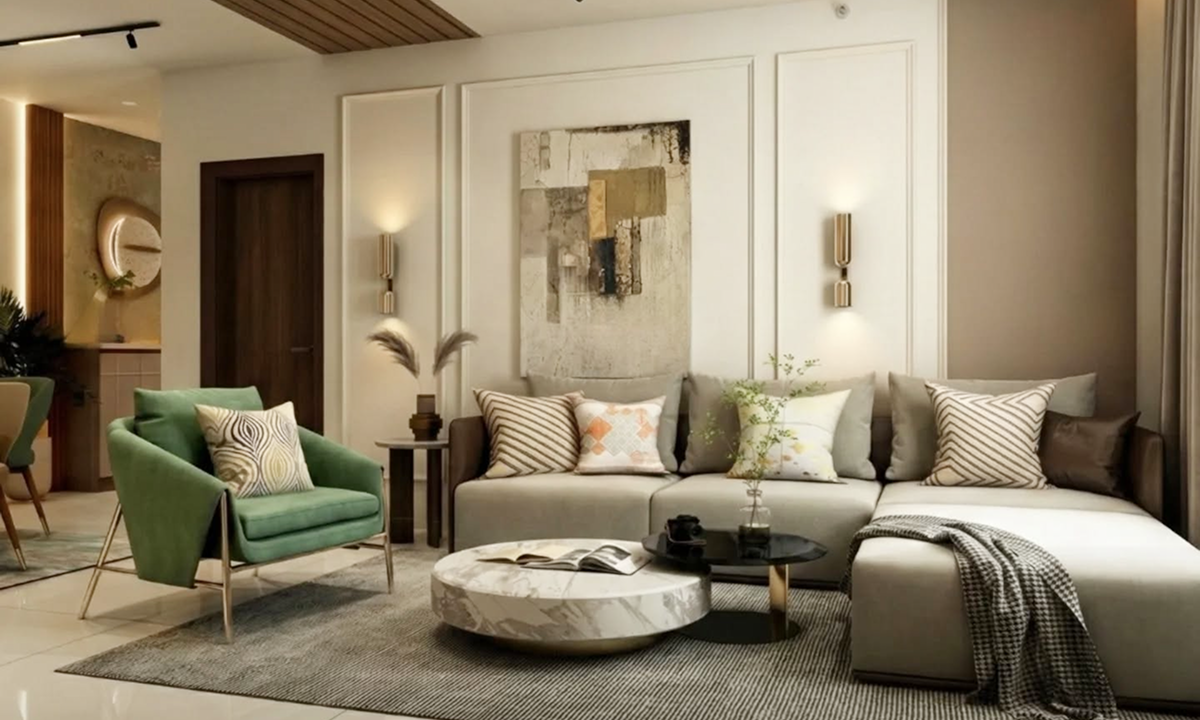 Contemporary living room featuring a light grey sectional sofa, marble coffee table, and an accent sage green armchair with gold legs against white paneled walls.