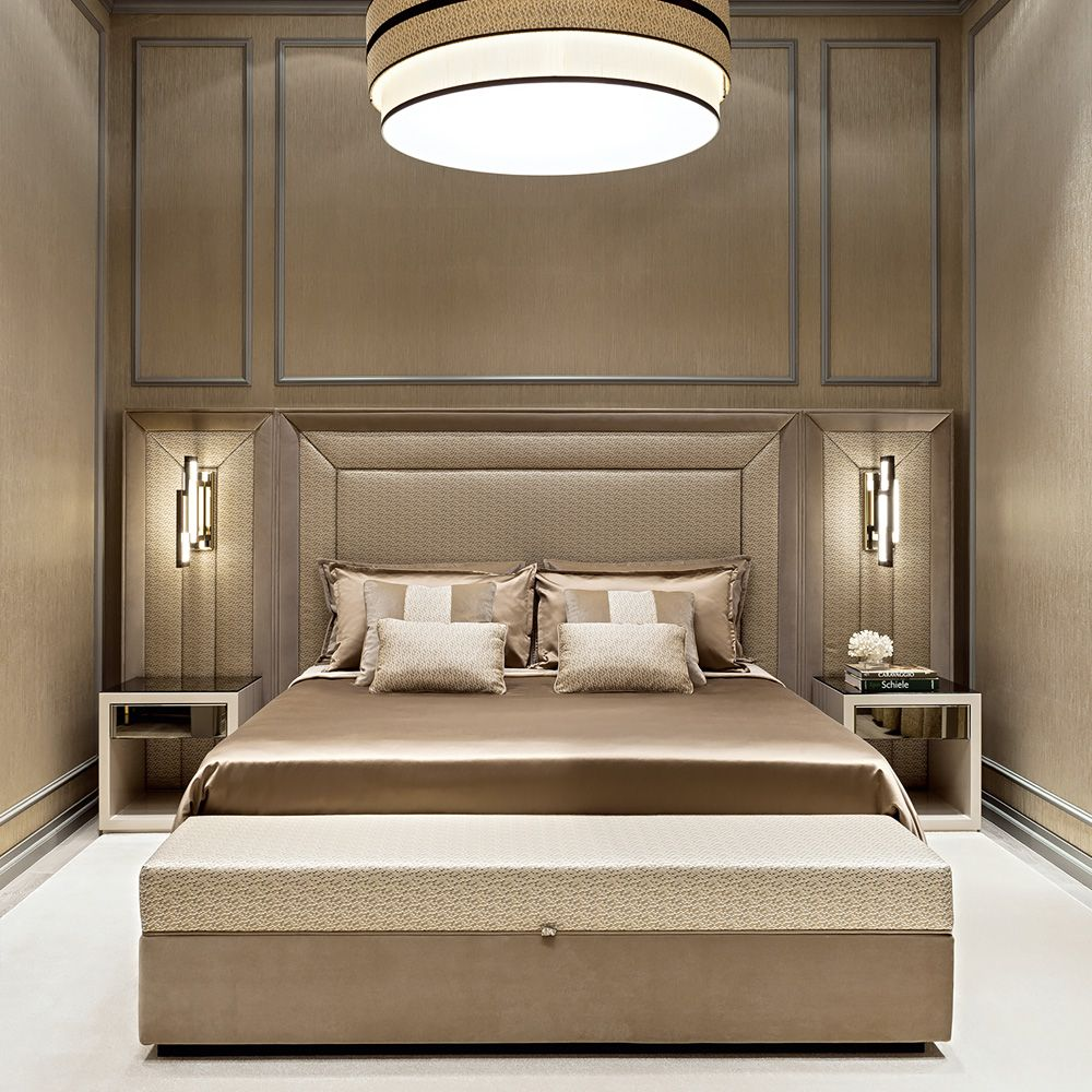 Luxury bedroom with upholstered headboard and matched side tables