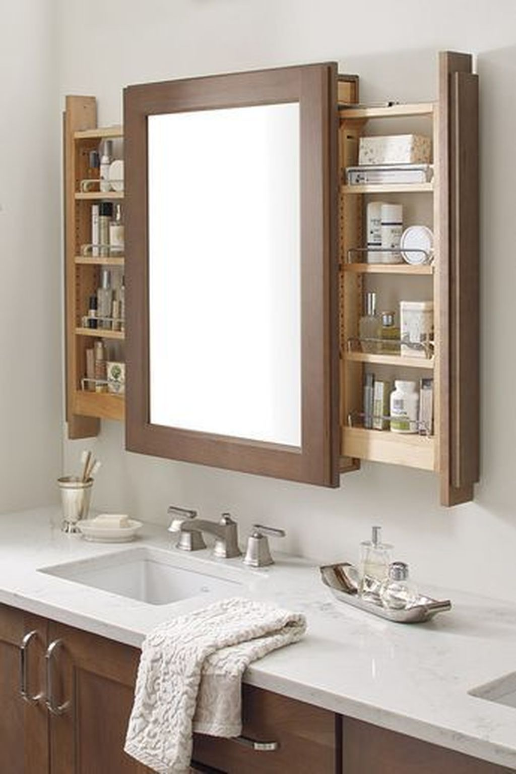 Storage units built into a luxury bathroom vanity wall